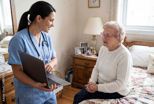 A young female doctor with a laptop shows examination results to an elderly woman.