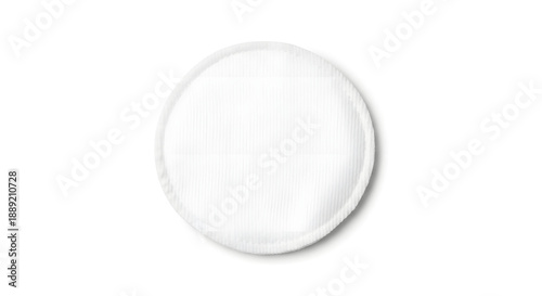 A single white circular cotton pad, soft and absorbent, isolated on a clean white background.
