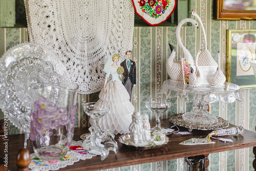 Fotografie Vintage wedding items and decoration at a brightly lit antique store