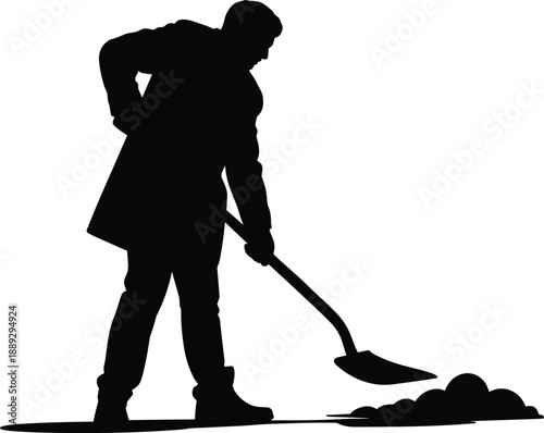 Silhouette of a person shoveling outdoors, wearing boots and coat, representing manual labor, winter work, and physical effort in maintenance or construction tasks
