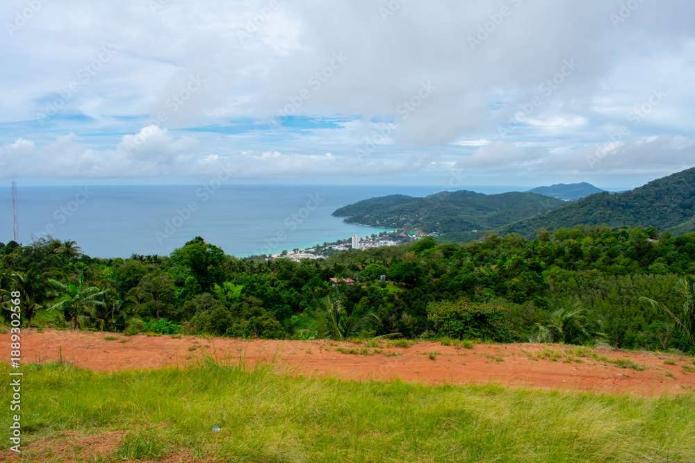Obraz premium Aerial view from Big Buddha on Coast of Phuket Island in Thailand. Beautiful landscape Jungle and turquoise blue water of Andaman Sea 