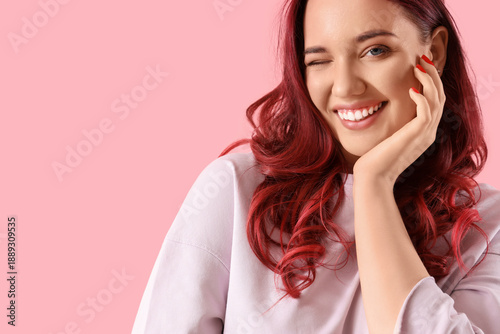 Happy young woman with red ...
