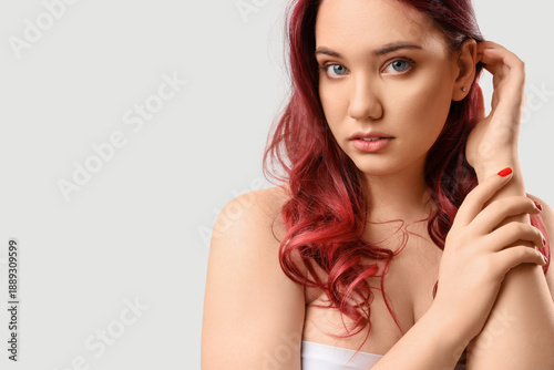 Beautiful young woman with ...