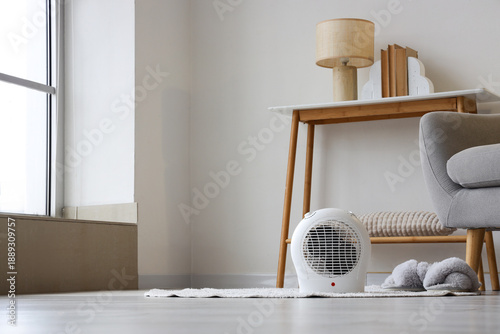 Electric fan heater with sl...