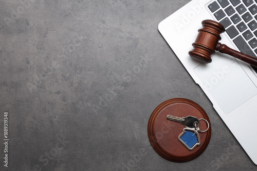 Laptop with auction gavel a...
