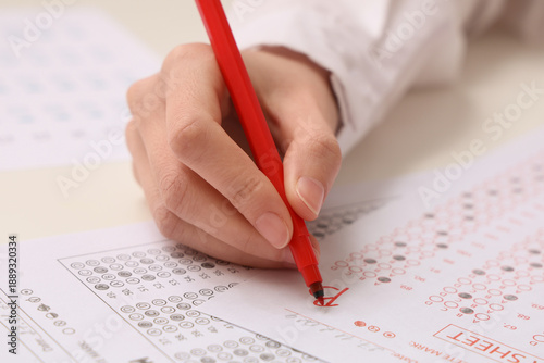 Female teacher writing resu...
