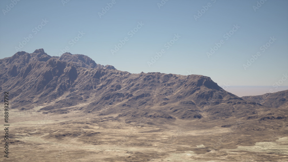 Fototapeta premium Arid mountain ridge under pale sky, warm sunlight sweeping over stony basin and weathered slopes, minimal vegetation, textured rock formations, wide panoramic