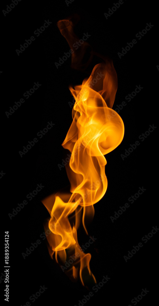 Fototapeta premium Fire and burning flame isolated on dark background for graphic design purpose