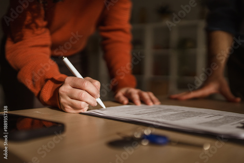 Obraz na plátně Person signing legal contract for real estate deal