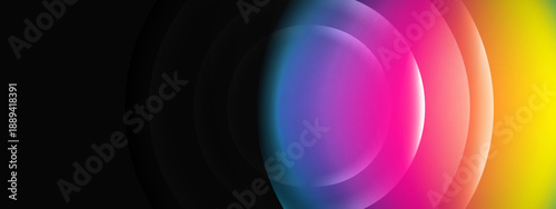 Atmospheric dark background with glowing concentric circles in rainbow colors and soft light blur