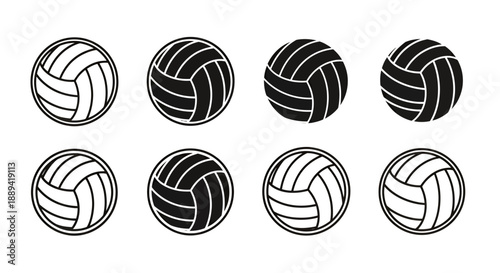Collection of volleyballs displaying alternating black and white patterns in a row.