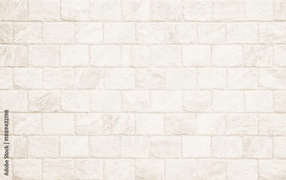 Fototapeta premium Detail of modern cream brick wall background photo. White light brick wall texture background for stone tile block painted in beige light color wallpaper modern interior and exterior backdrop design.