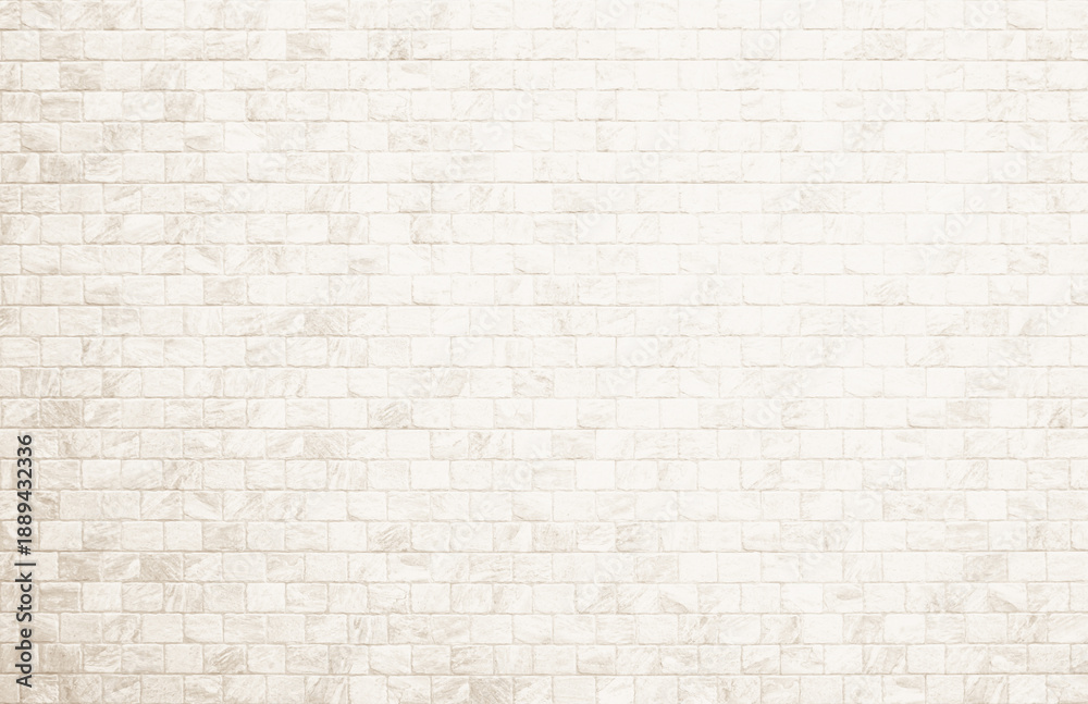Fototapeta premium Detail of modern cream brick wall background photo. White light brick wall texture background for stone tile block painted in beige light color wallpaper modern interior and exterior backdrop design.