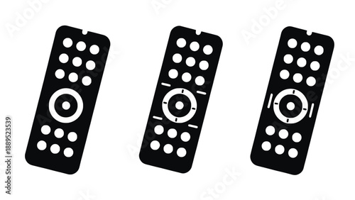 Three black remote controls on a white background for technology concept