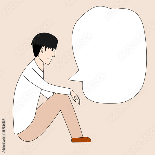 Man is sitting on the ground with his head down