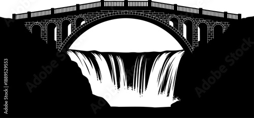 Stone bridge silhouette spanning over a powerful waterfall