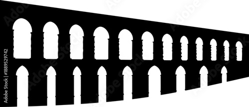 Silhouette of a long roman style aqueduct with many arches