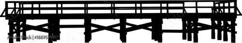 Long wooden pier silhouette with horizontal supports