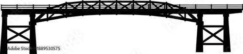 Long wooden trestle bridge silhouette with complex timber support frame