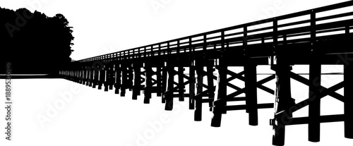 Long wooden pier trestle bridge silhouette perspective