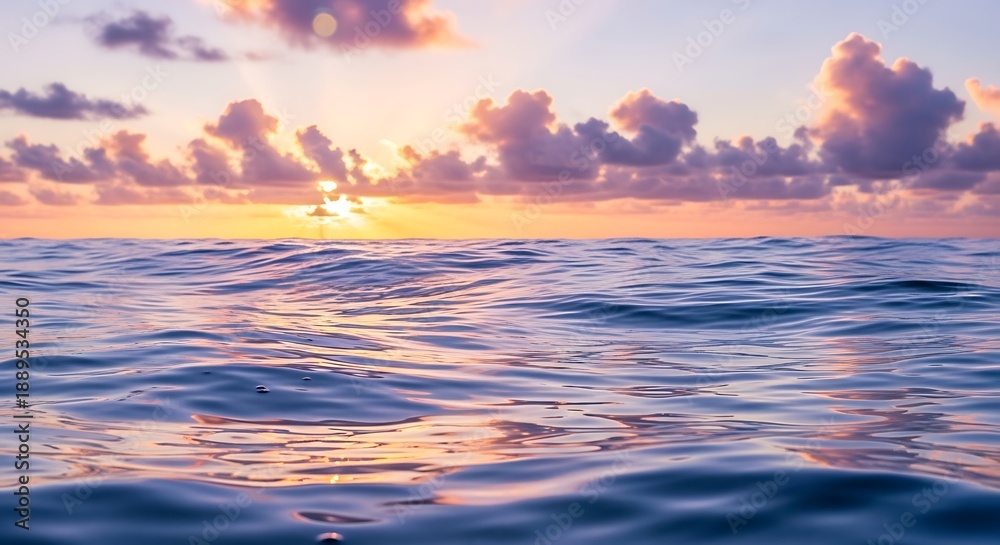 Obraz premium A serene image capturing the sunset over the ocean. 