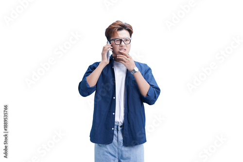 Concerned Call: A person, engrossed in a phone conversation, wears an expression of worry, hand to chin, lost in thought. A poignant image for those in challenging situations