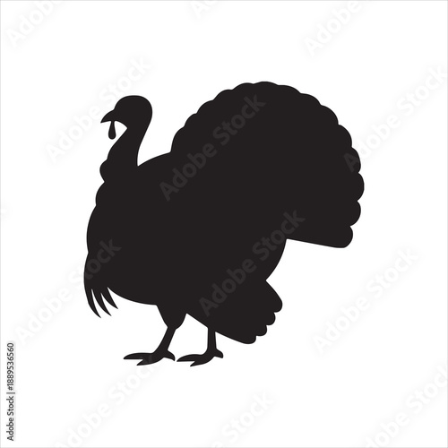 A striking black silhouette of a proud turkey in profile silhouette