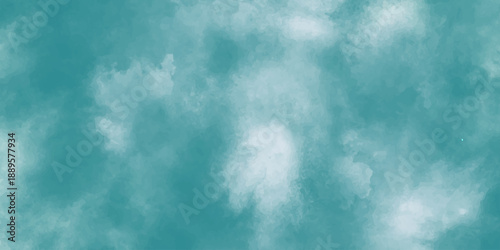 A vibrant summer cloudscape features white clouds drifting across a bright blue sky, capturing the natural beauty of the atmosphere and light on a clear day