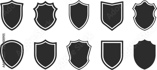 Set of black shield icons with white outlines, representing protection, security, heraldry, branding, strength, and graphic design elements