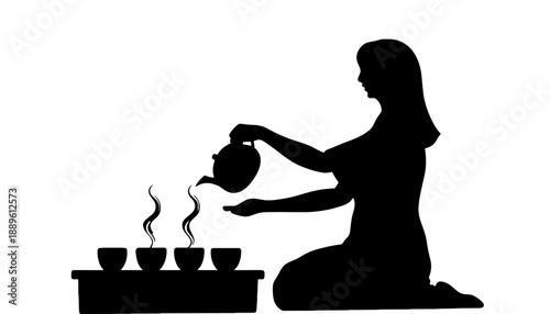 A woman pouring tea from a teapot into a cup on a tray