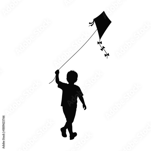 Silhouette of young boy joyfully running across grassy field, holding string of kite soaring high in blue sky, pure childhood happiness