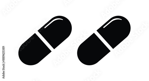 Two black capsule pills displayed against a white background silhouette