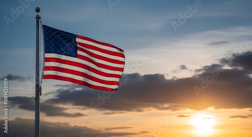 American flag waving in the wind at sunset