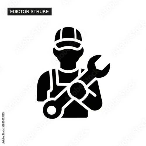 A worker in overalls and a mask holding wrenches in a maintenance setting