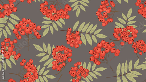 Seamless pattern of red rowan berries and green leaves arranged on a dark grey background, creating a cozy autumnal forest aesthetic.