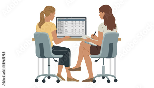 Two women sitting at a table with a computer discussing sdkh document