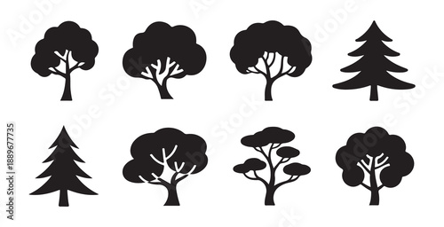 Set of eight black silhouette forest trees, flat style vector illustration of deciduous and coniferous plants
