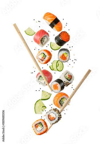 Assorted Japanese sushi and maki rolls with chopsticks falling isolated PNG with Transparent Background