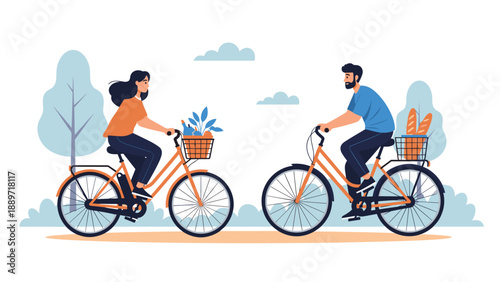 Young couple enjoying a peaceful bike ride together in a scenic park with baskets filled with fresh healthy food and bread.