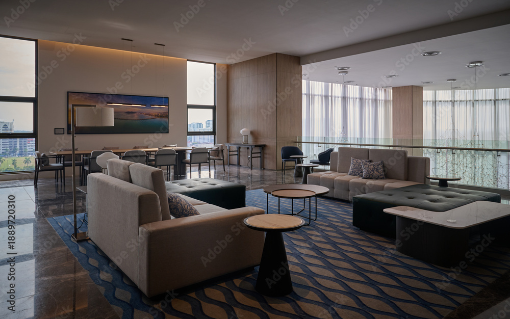 Fototapeta premium Modern Luxury Hotel Lounge with Sofa Seating and City View