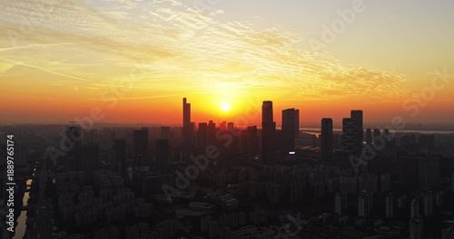 Aerial view of modern city at sunset