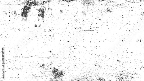 Black speckles and grunge textures on a white background abstract