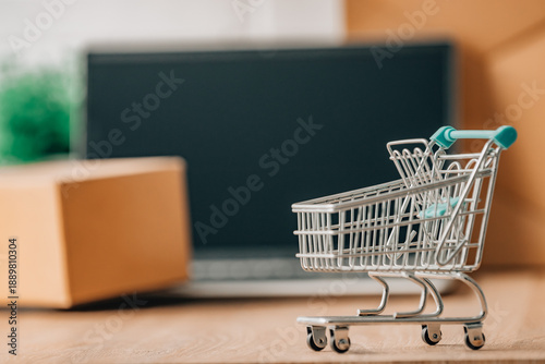 Quadro su tela shopping cart with laptop and packages, online shopping