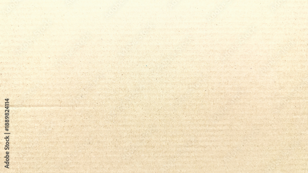 Fototapeta premium corrugated cardboard texture in beige hues showcasing horizontal ridges and subtle gradients inspiring sustainable packaging designs