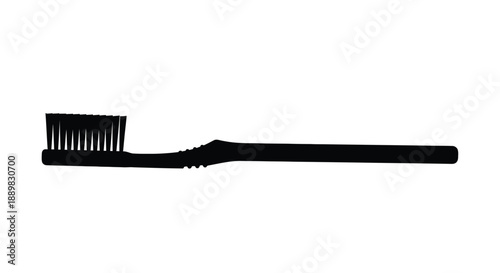Silhouette of a toothbrush against a plain white background