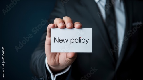 New policy announcement concept, professional holding policy update card for corporate communication and business news
