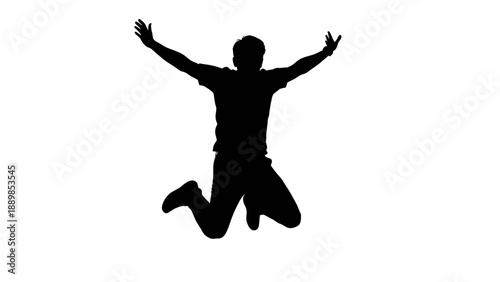 Man jumping in the air with arms outstretched and legs bent, silhouette photography