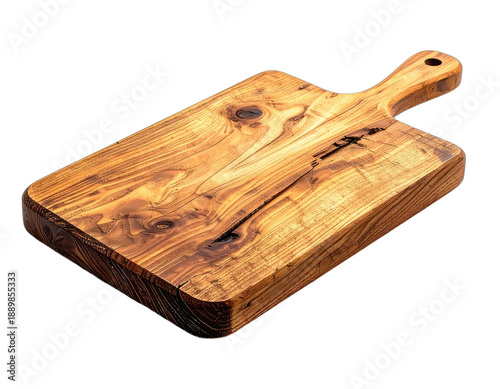 Angled shot of a well-worn, rectangular cutting board with a handle, on a black background