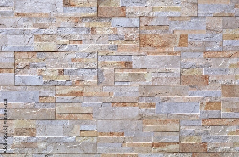 Obraz premium Stoneware paneling wall with natural stone bricks effect. Colors are yellow, gray and light brown. Background and texture.