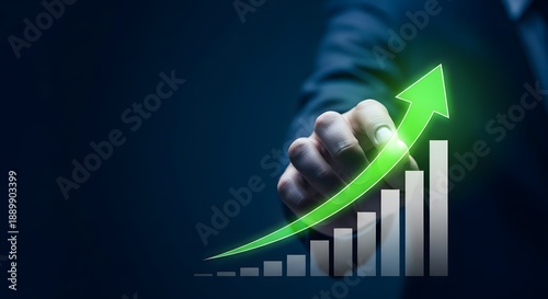 A hand pointing to a rising green arrow on a bar graph